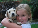 Chief Puppy Cuddler Katherine with Dexter